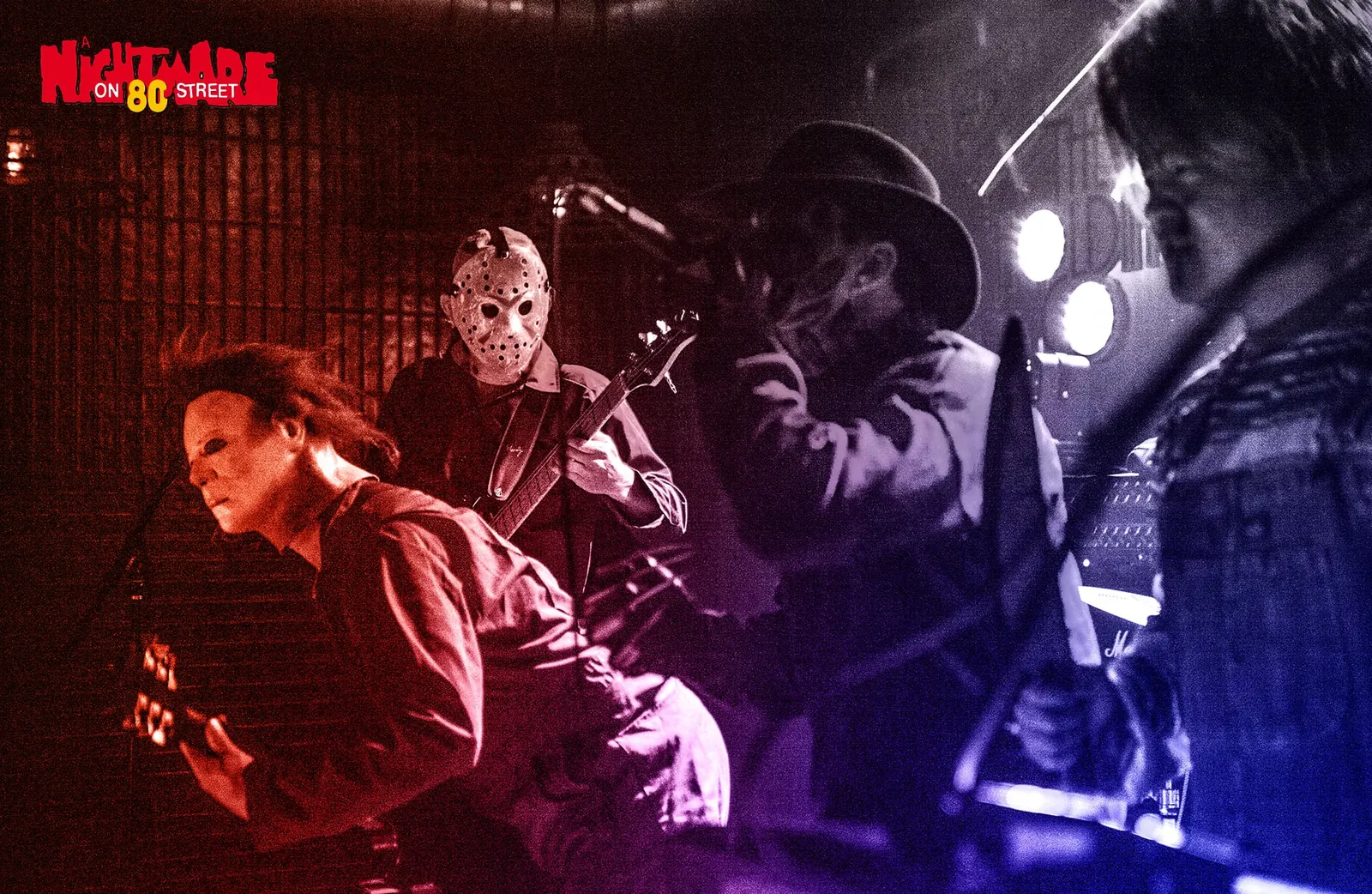 Masked band members performing under red and blue stage lights